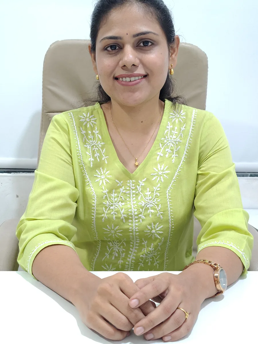 Dr. Aditi at her clinic desk